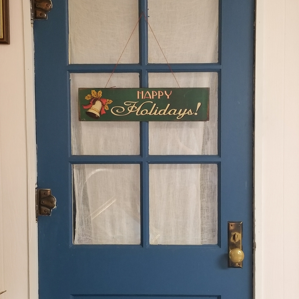 Vintage Happy Holidays tin sign